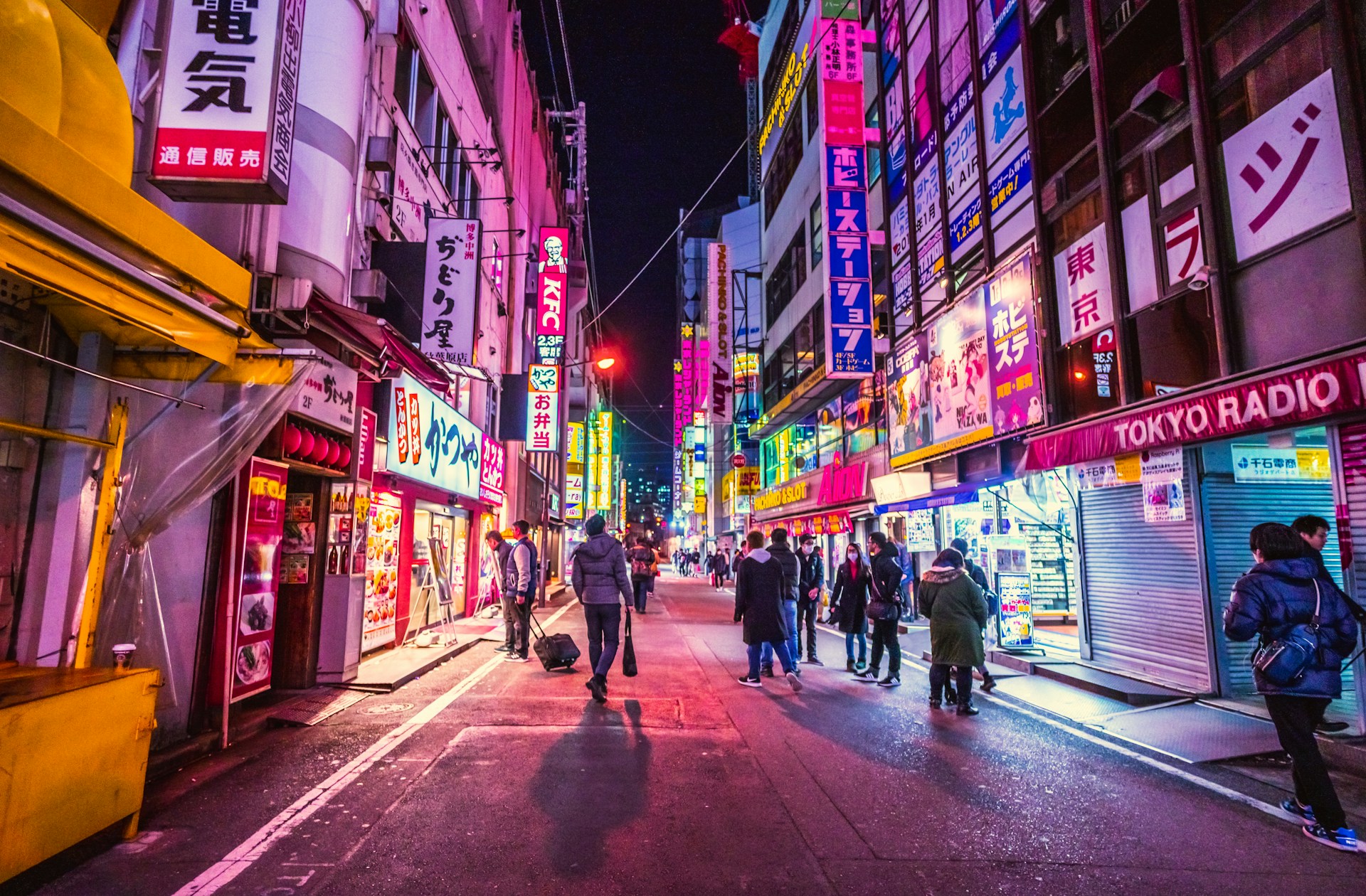 A busy and brightly lit street in Tokyo