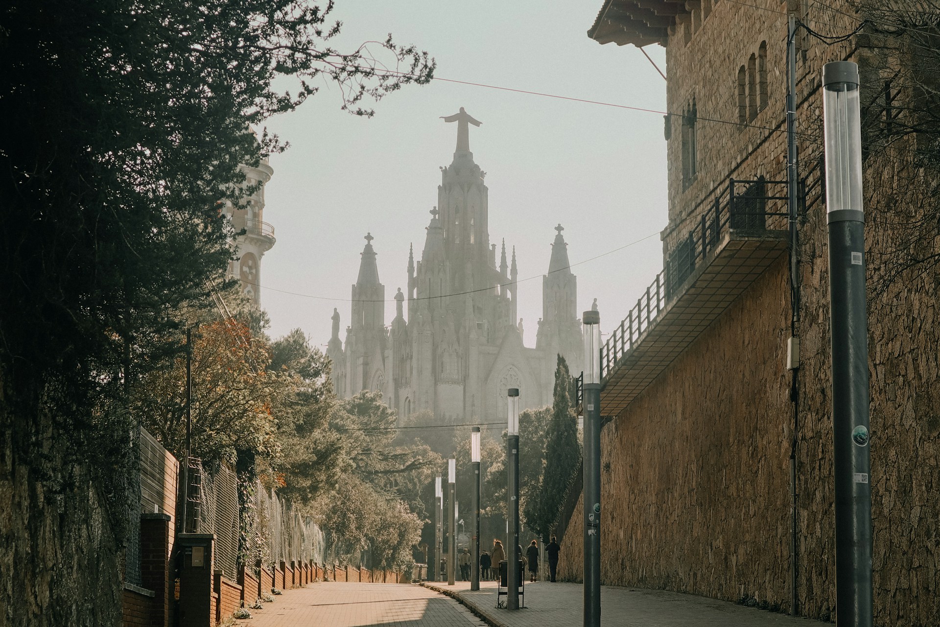 A quiet street in Barcelona, with the 
Tibidabo Church in the background