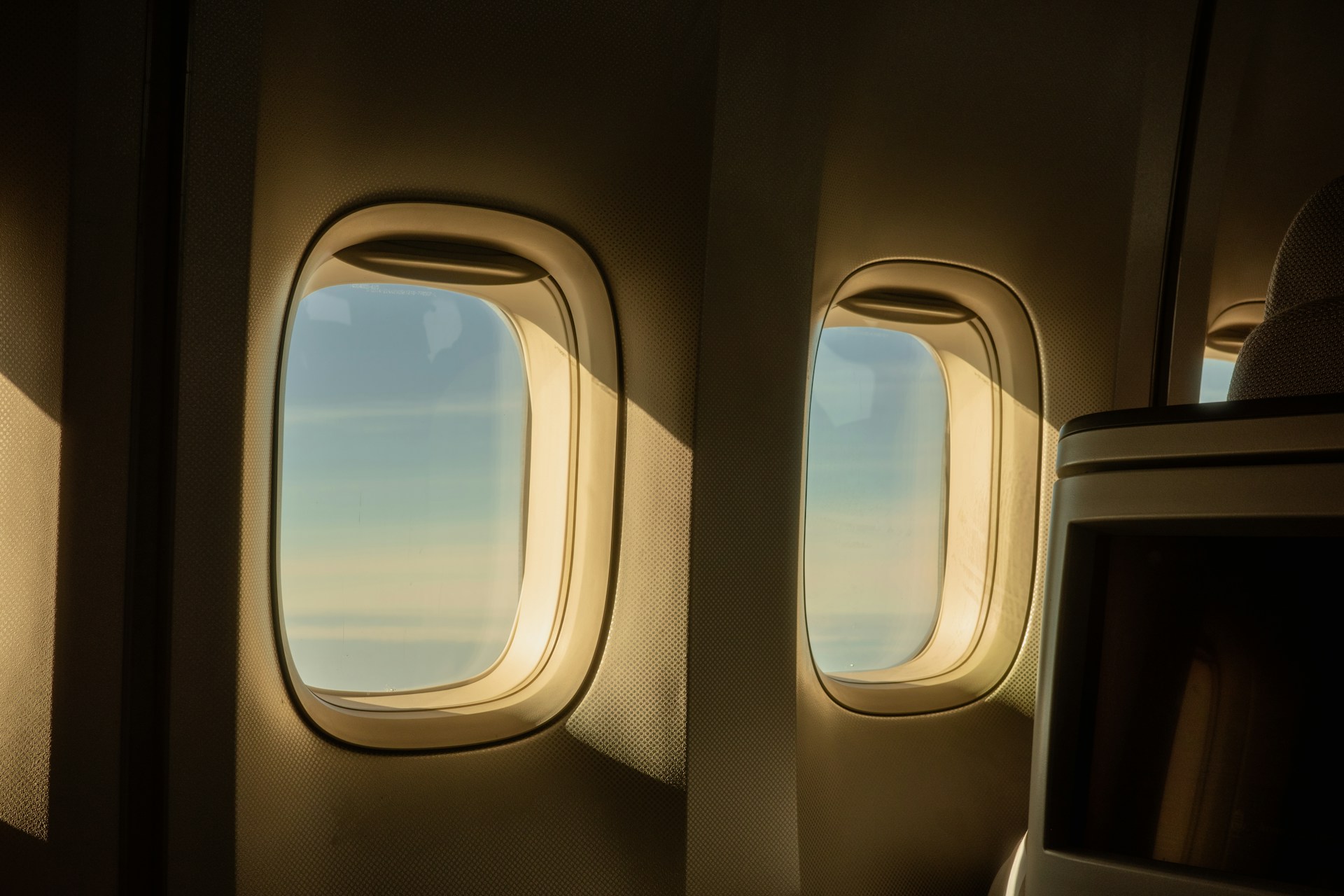 Sunset light coming through plane windows