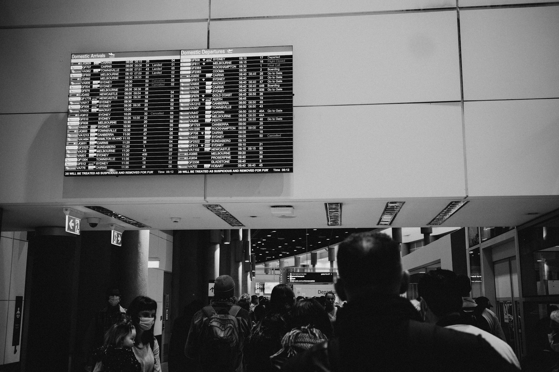 A greyscale image of a departure board