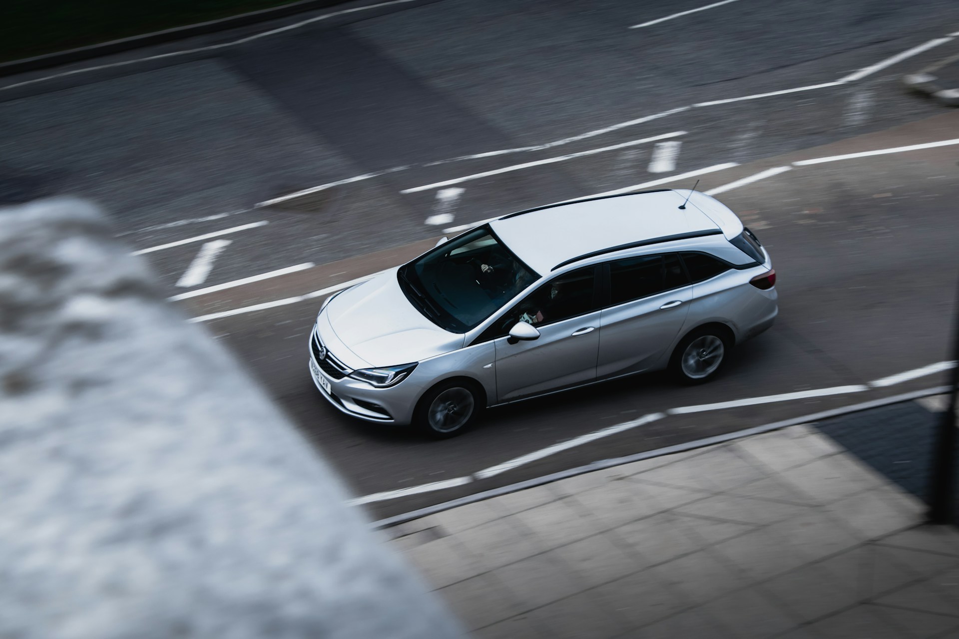A Vauxhall driving down the road