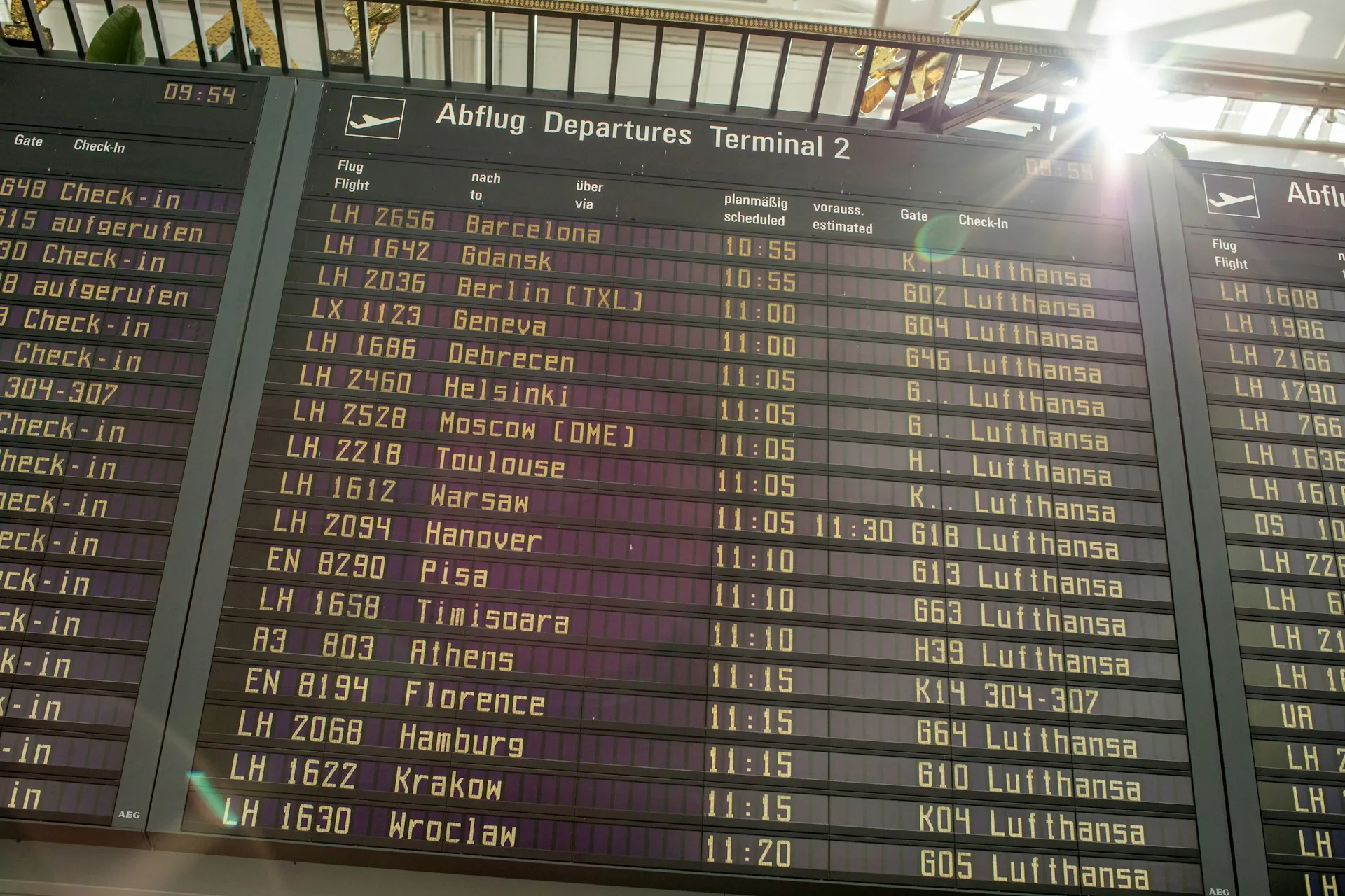 A large departure board of flights